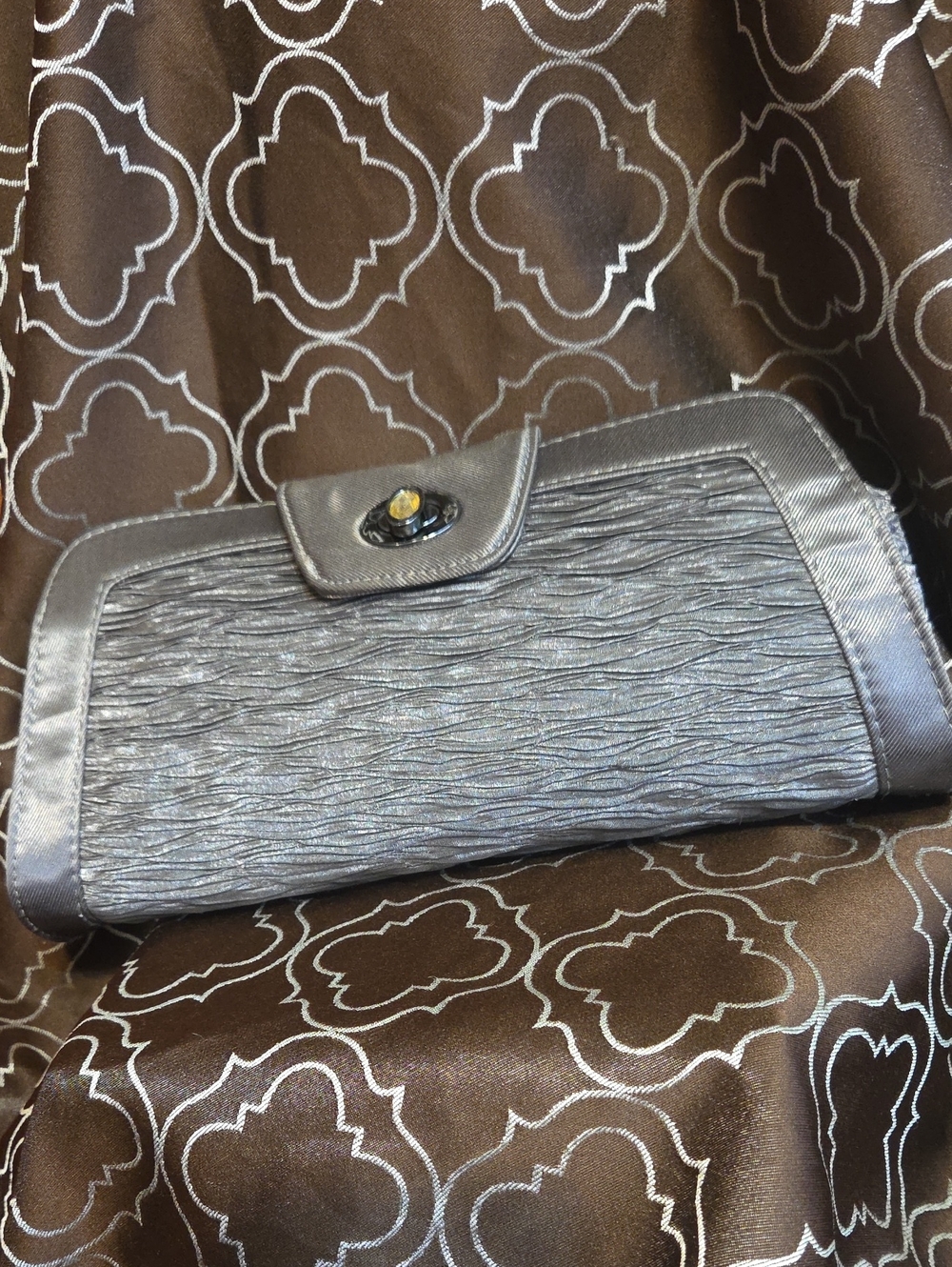 Stylish J. Reneè Silver Clutch Bag.